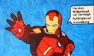 Man sieht eine bunte Zeichnung des Superhelden Ironman in rotem Anzug, der die Hand nach vorne streckt. Der Hintergrund ist blau. In einer Sprechblase steht "Herzlich Willkommen zur Christoph-Schlingensief-Ausstellung."