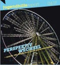 Titelblatt-Ausschnitt vom Jugendhilfereport 04/2017: Riesenrad aus der Froschperspektive vor schwarzem Hintergrund